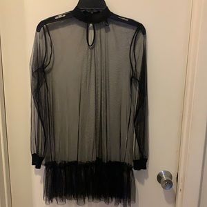 Sheer turtle neck tunic top